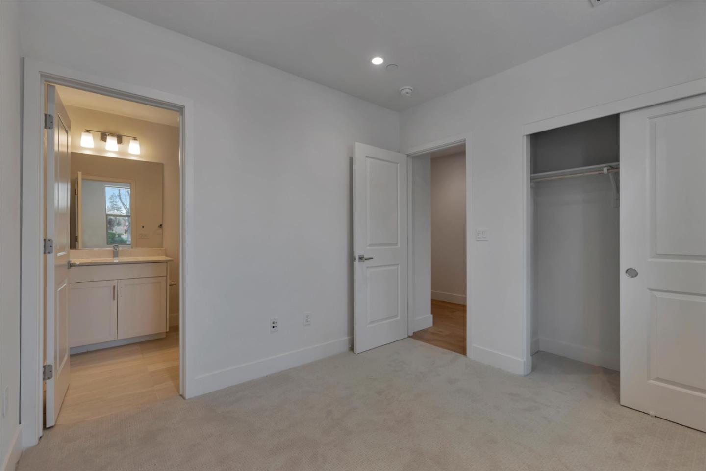 2741 Oak Road Walnut Creek, CA 94597 - Photo 4 of 20 a view of a room with a birdcage and a bathroom