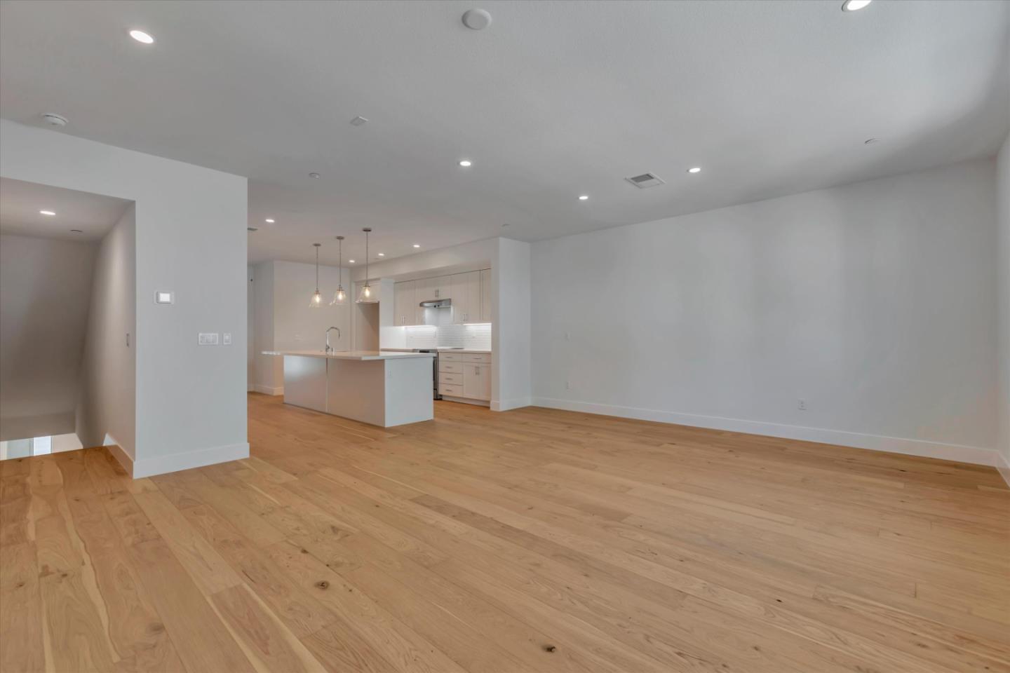 2741 Oak Road Walnut Creek, CA 94597 - Photo 6 of 20 a view of empty room with wooden floor