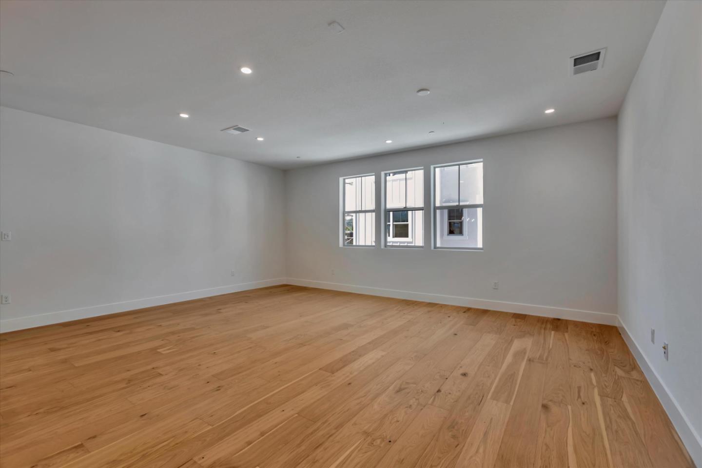 2741 Oak Road Walnut Creek, CA 94597 - Photo 7 of 20 a view of empty room with wooden floor and fan