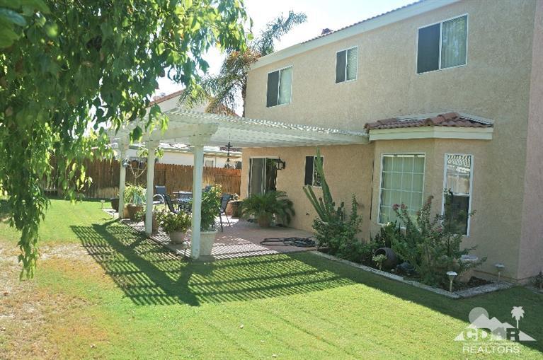 80928 Rio Grande Avenue Indio, CA 92201 - Photo 22 of 25 a view of a house with backyard and garden