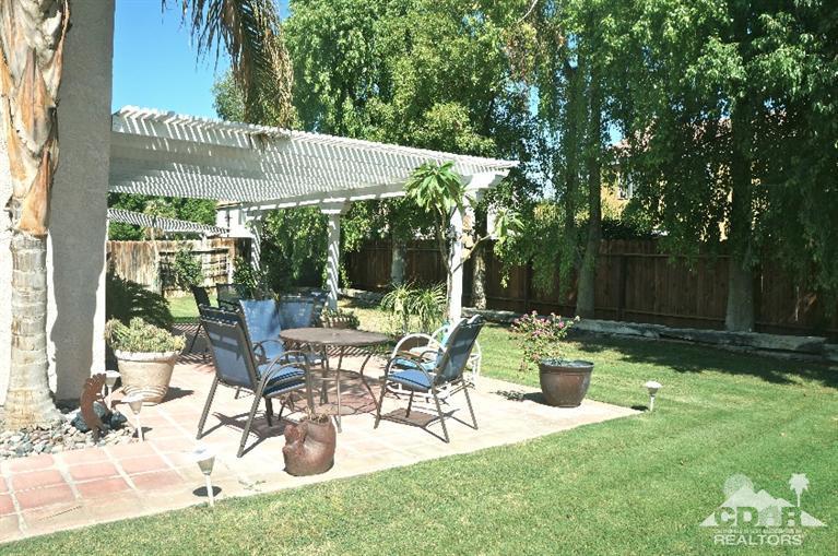 80928 Rio Grande Avenue Indio, CA 92201 - Photo 24 of 25 a view of backyard with sitting area and garden