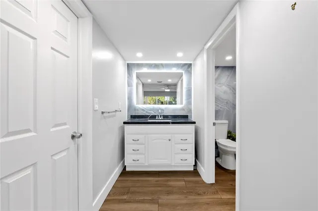 a room with mirror and window