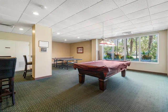 a bed room with a bed and a table