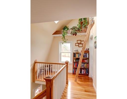 134 Main Street Rutland, MA 01543 - Photo 6 of 24 a view of a hallway with wooden floor and entryway