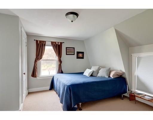 134 Main Street Rutland, MA 01543 - Photo 9 of 24 a bedroom with a bed and window