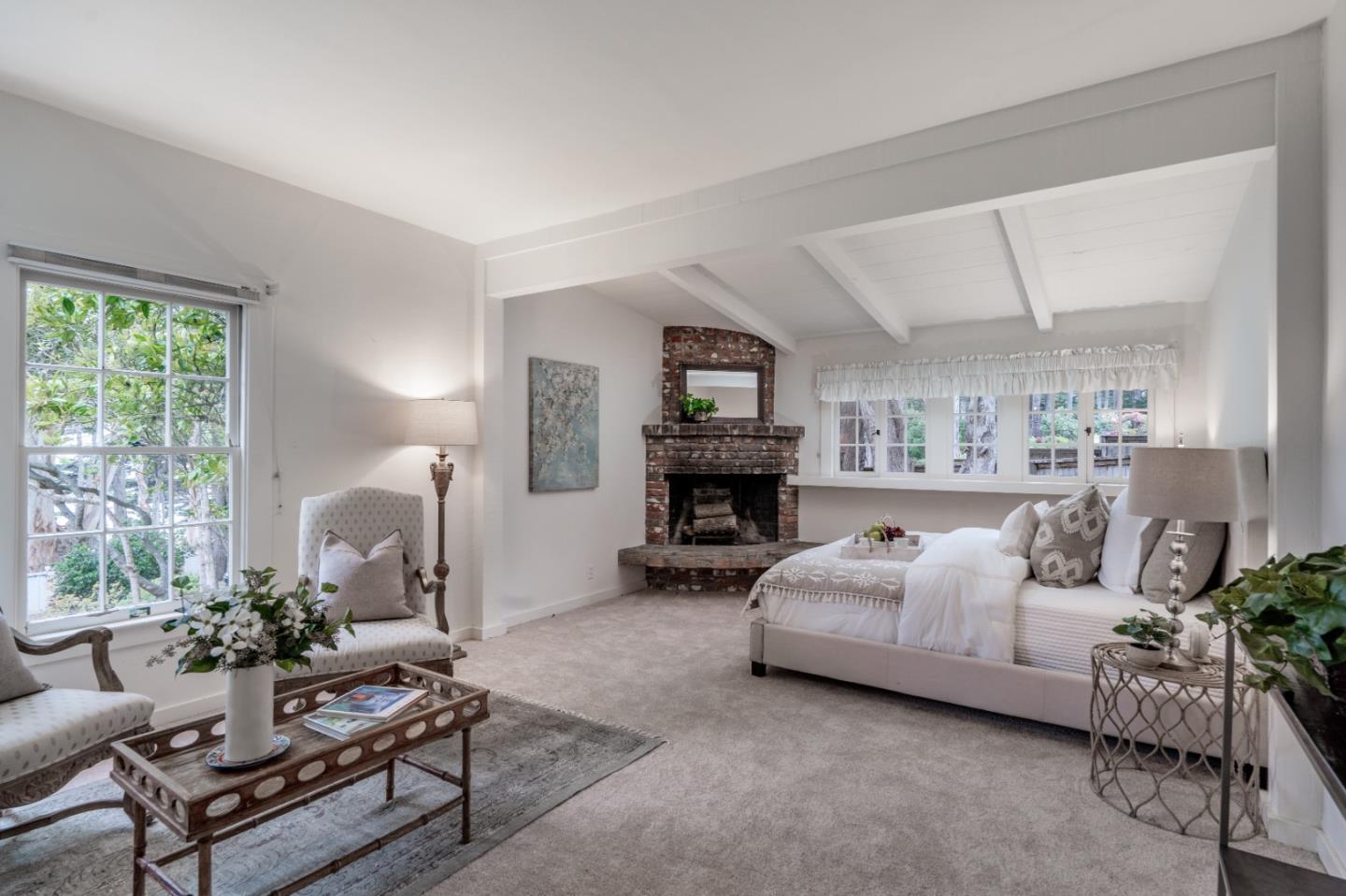161 Spindrift Road Carmel, CA 93923 - Photo 11 of 20 a living room with furniture and a fireplace