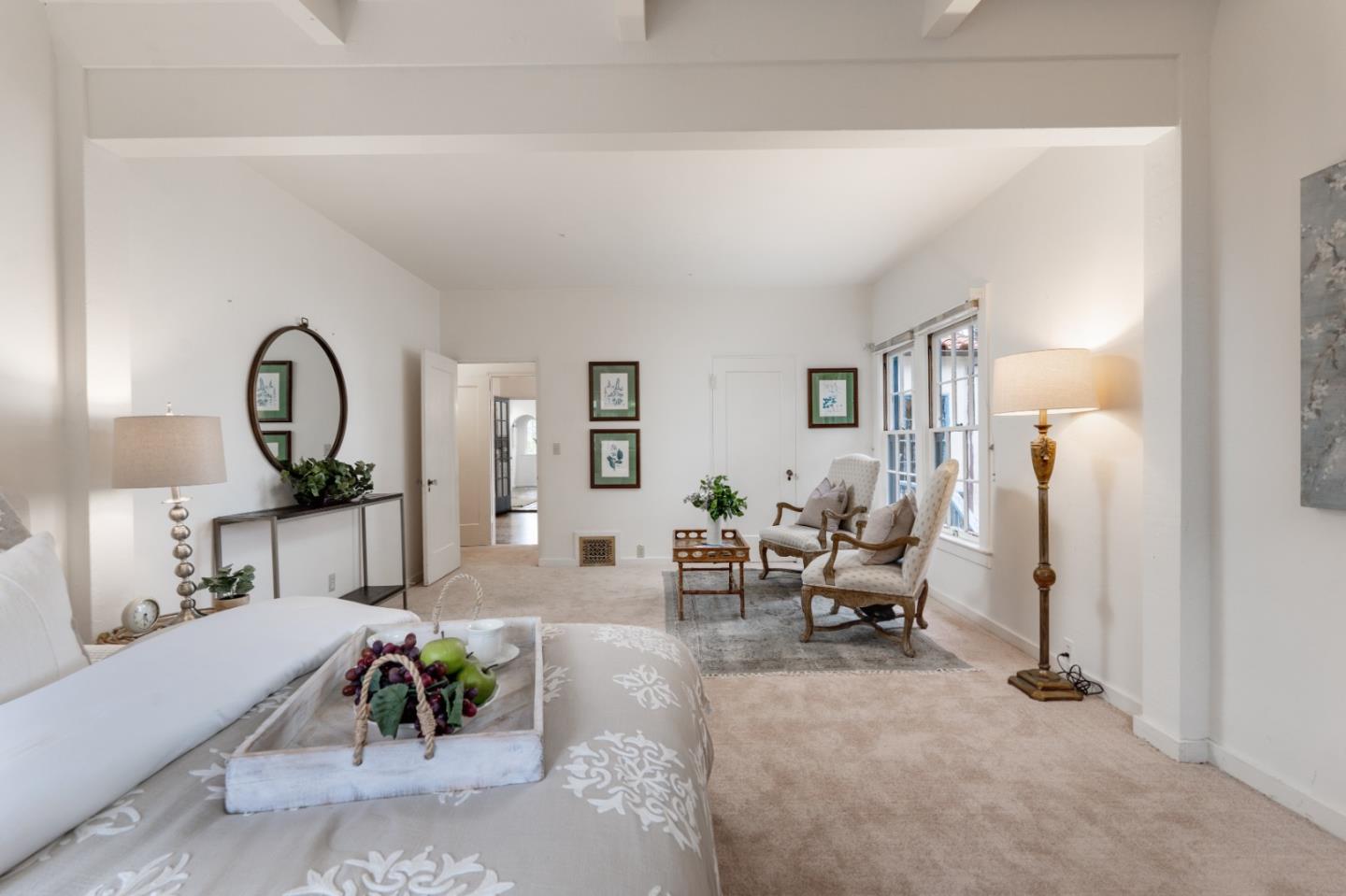 161 Spindrift Road Carmel, CA 93923 - Photo 13 of 20 a living room with furniture and a mirror