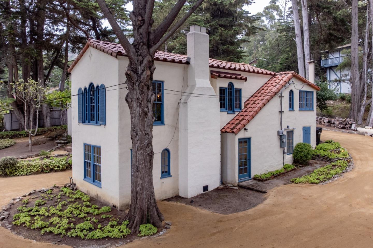 161 Spindrift Road Carmel, CA 93923 - Photo 19 of 20 a view of a house with a tree in front