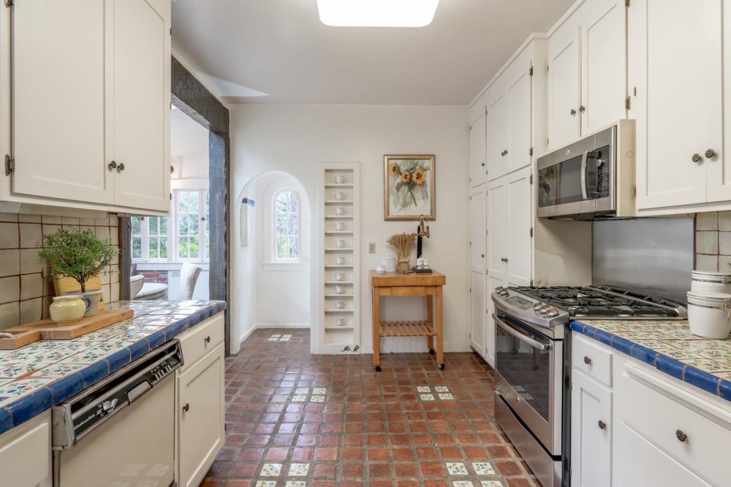 161 Spindrift Road Carmel, CA 93923 - Photo 8 of 20 a kitchen with stainless steel appliances granite countertop a stove a sink and a refrigerator