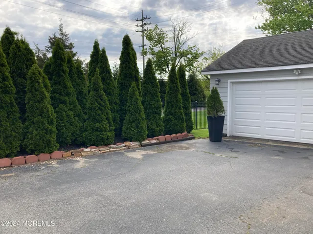 a view of a house with a street