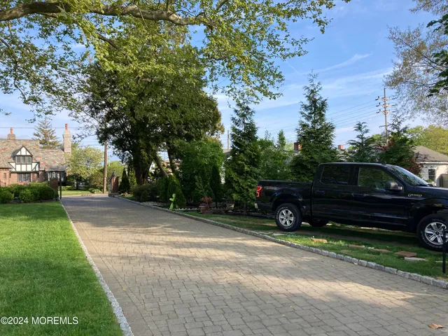 a car parked in front of a house