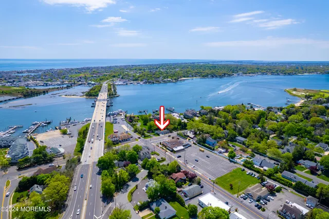 an aerial view of a city with lake view