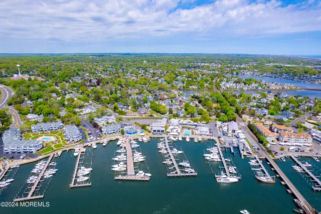 an aerial view of a house with a swimming pool
