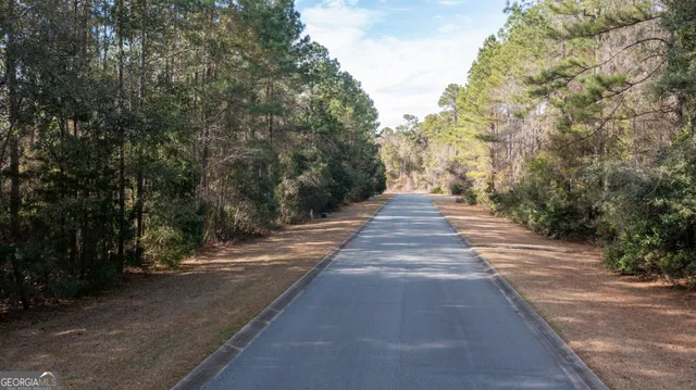 a view of a yard from a balcony