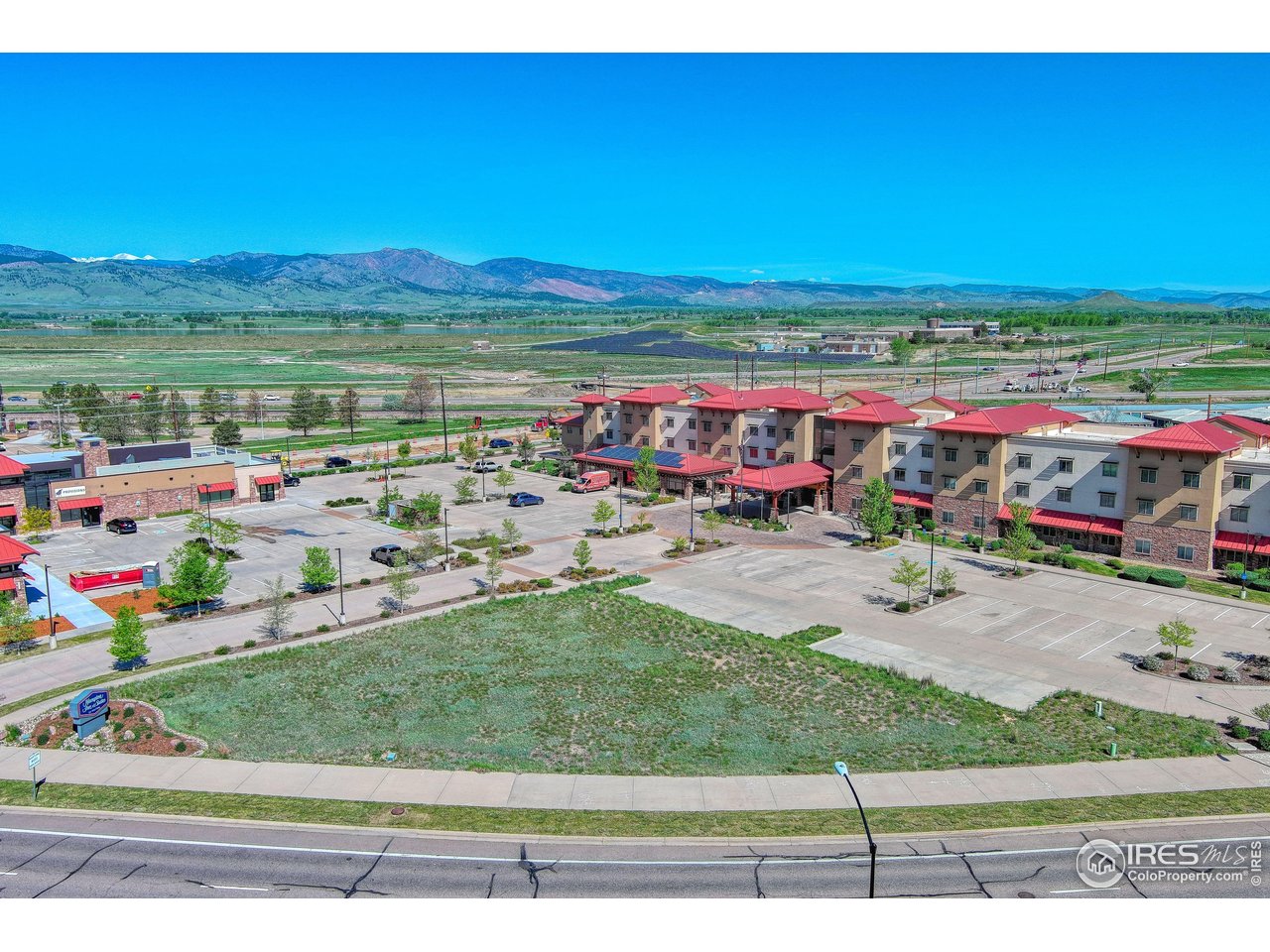 6375 Lookout Road Boulder, CO 80301 - Photo 3 of 4 a view of swimming pool with outdoor seating and trees in the background