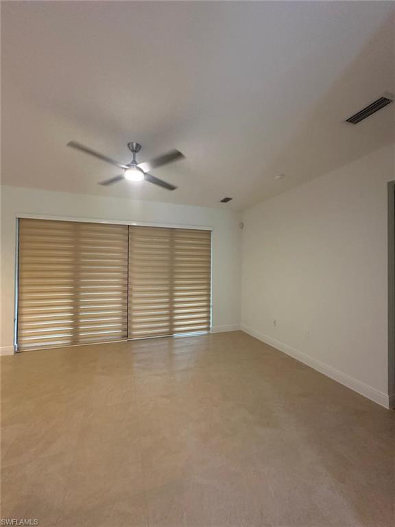 2167 Della Drive Naples, FL 34117 - Photo 16 of 17 a view of an empty room with a window