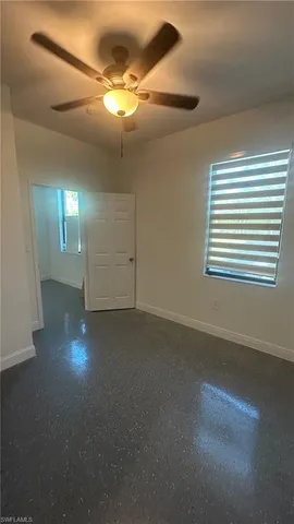 a kitchen with a cabinets and white stainless steel appliances