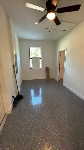 a bathroom with a toilet sink and shower
