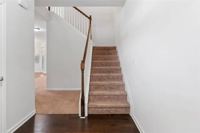 a view of entryway with wooden floor