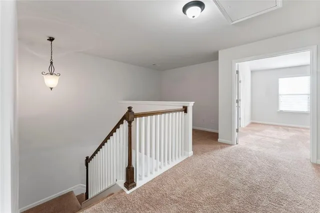 a view of a livingroom with a staircase