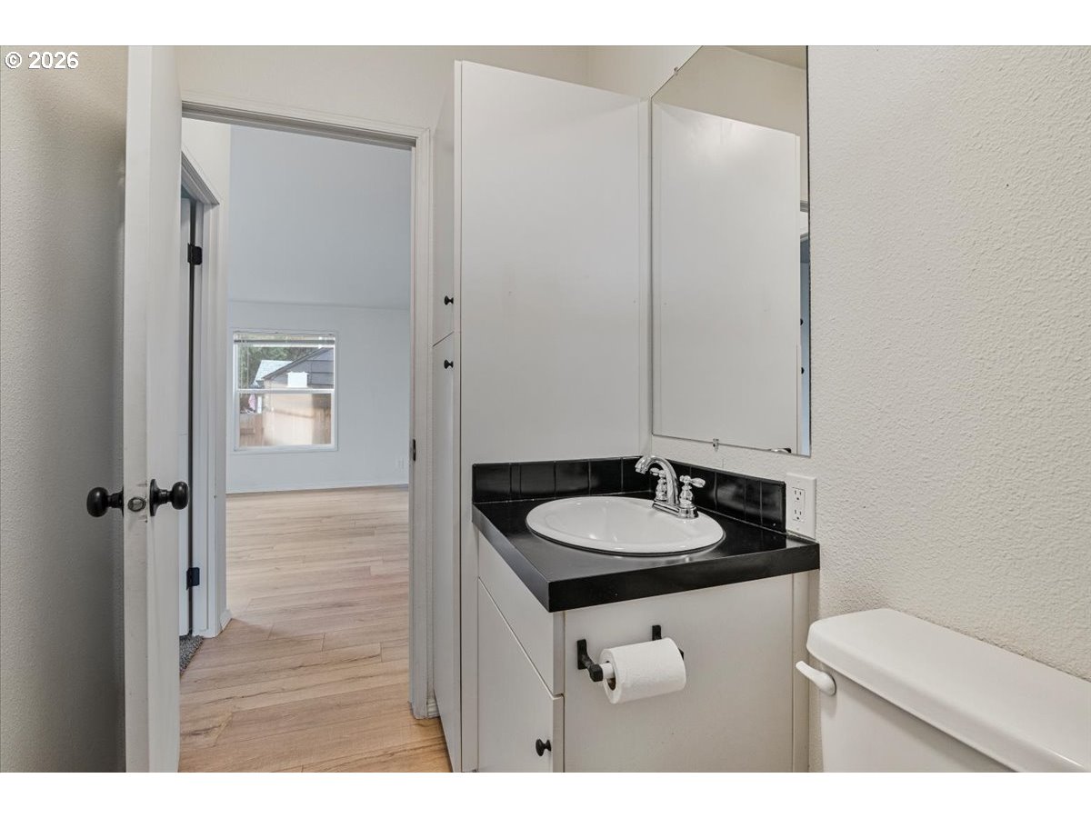 365 Southwest 7th Avenue Mill City, OR 97360 - Photo 23 of 43 a bathroom with a sink and a mirror