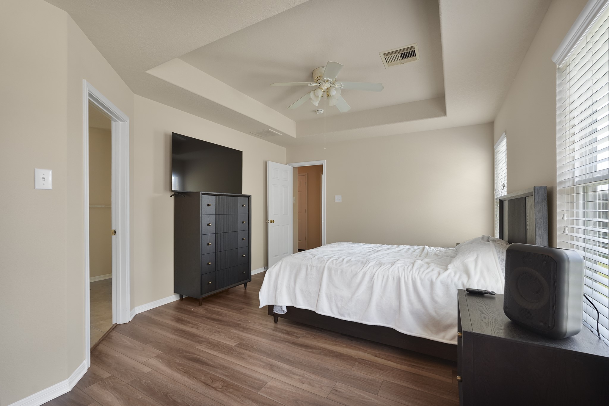 29417 Forest Floor Lane Spring, TX 77386 - Photo 17 of 25 a bedroom with a bed and wooden floor