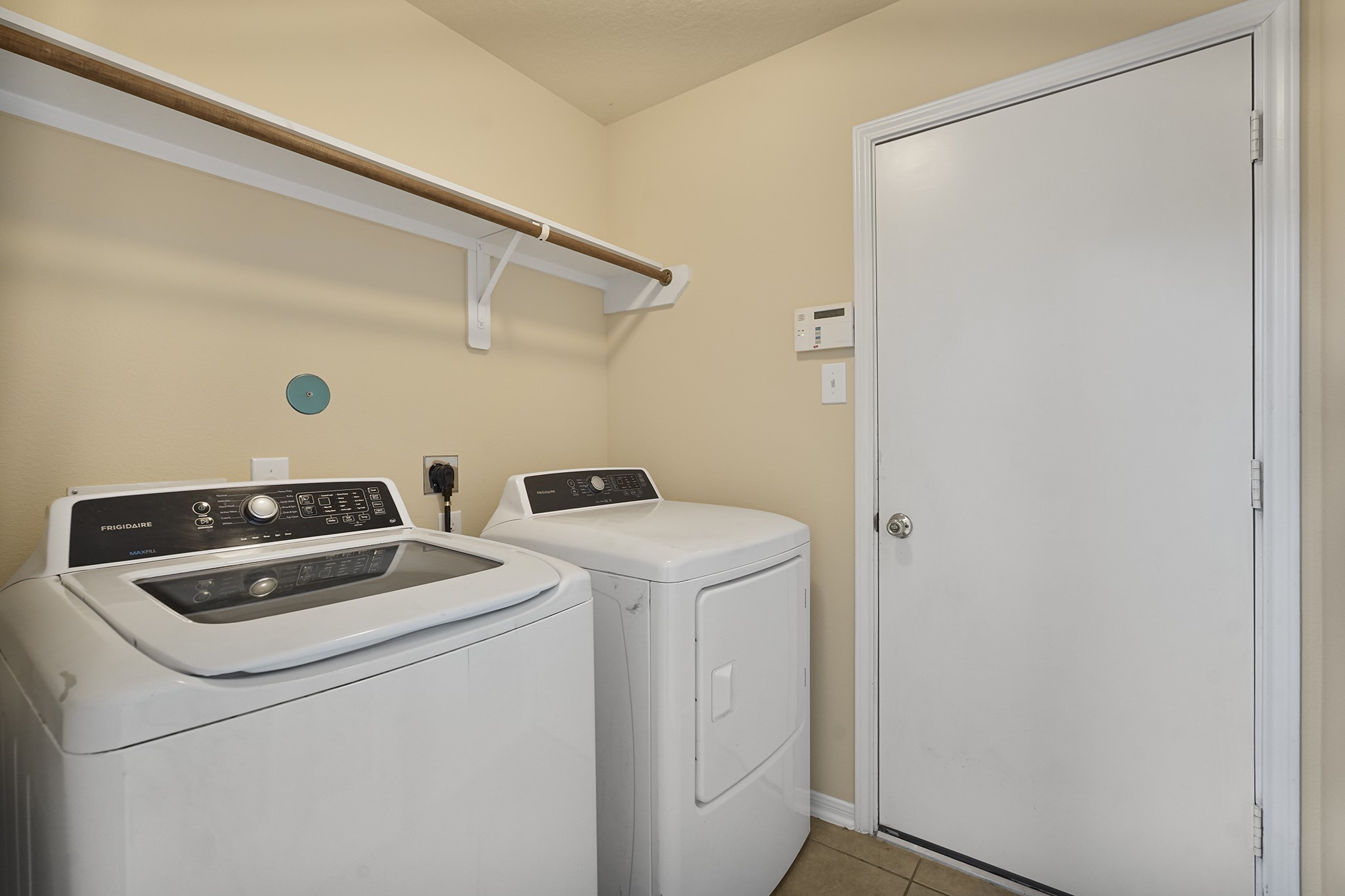 29417 Forest Floor Lane Spring, TX 77386 - Photo 7 of 25 a utility room with dryer and washer