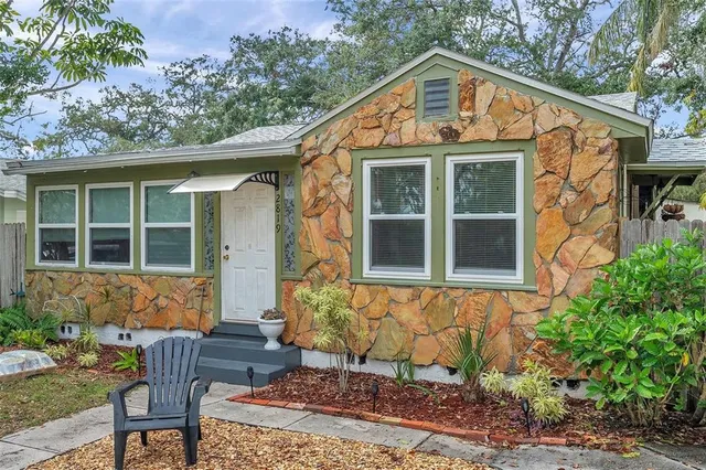 a front view of a house with patio