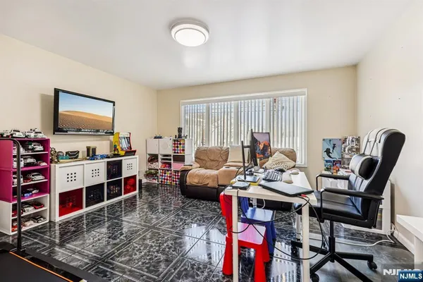 a bathroom with a sink a toilet and a shower