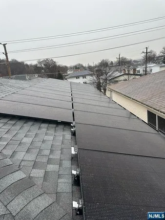 a picture of a room with a white wall and a picture
