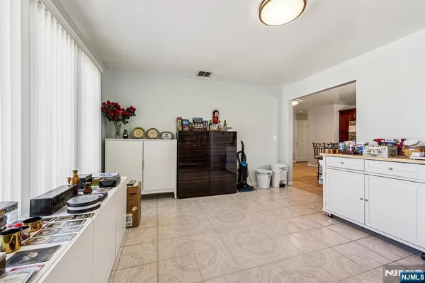 a room with furniture and gym equipment