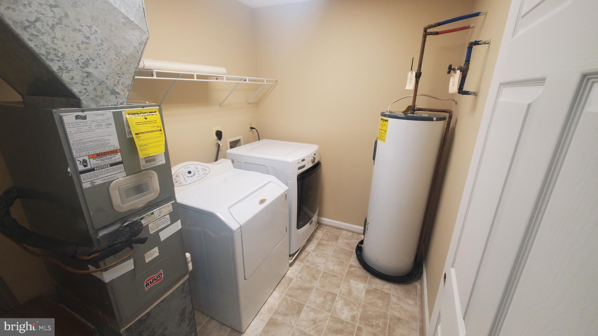 1292 South Ox Road Woodstock, VA 22664 - Photo 6 of 24 Utility room with W&D, NEW Heat Pump