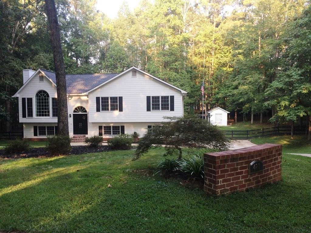 427 Dallas Nebo Road Dallas, GA 30157 - Photo 1 of 1 a view of a house with a yard and sitting area