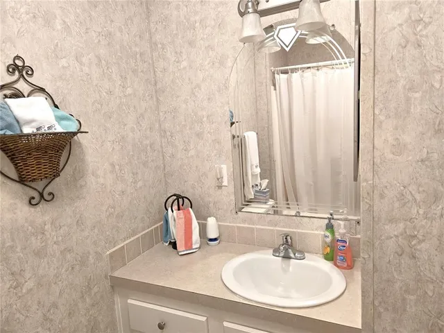 wooden floor and window in an empty room