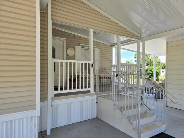 a view of a lake with a yard