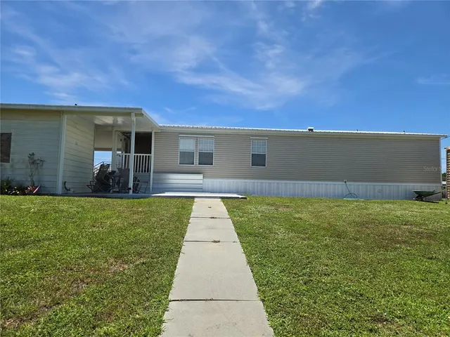 a view of a glass door with a balcony