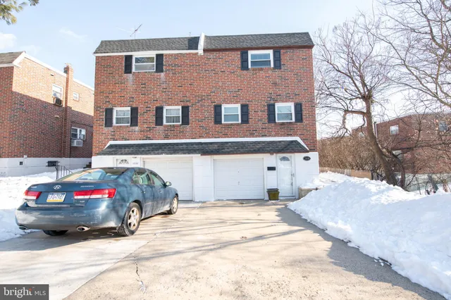 a view of a car park in front of a building