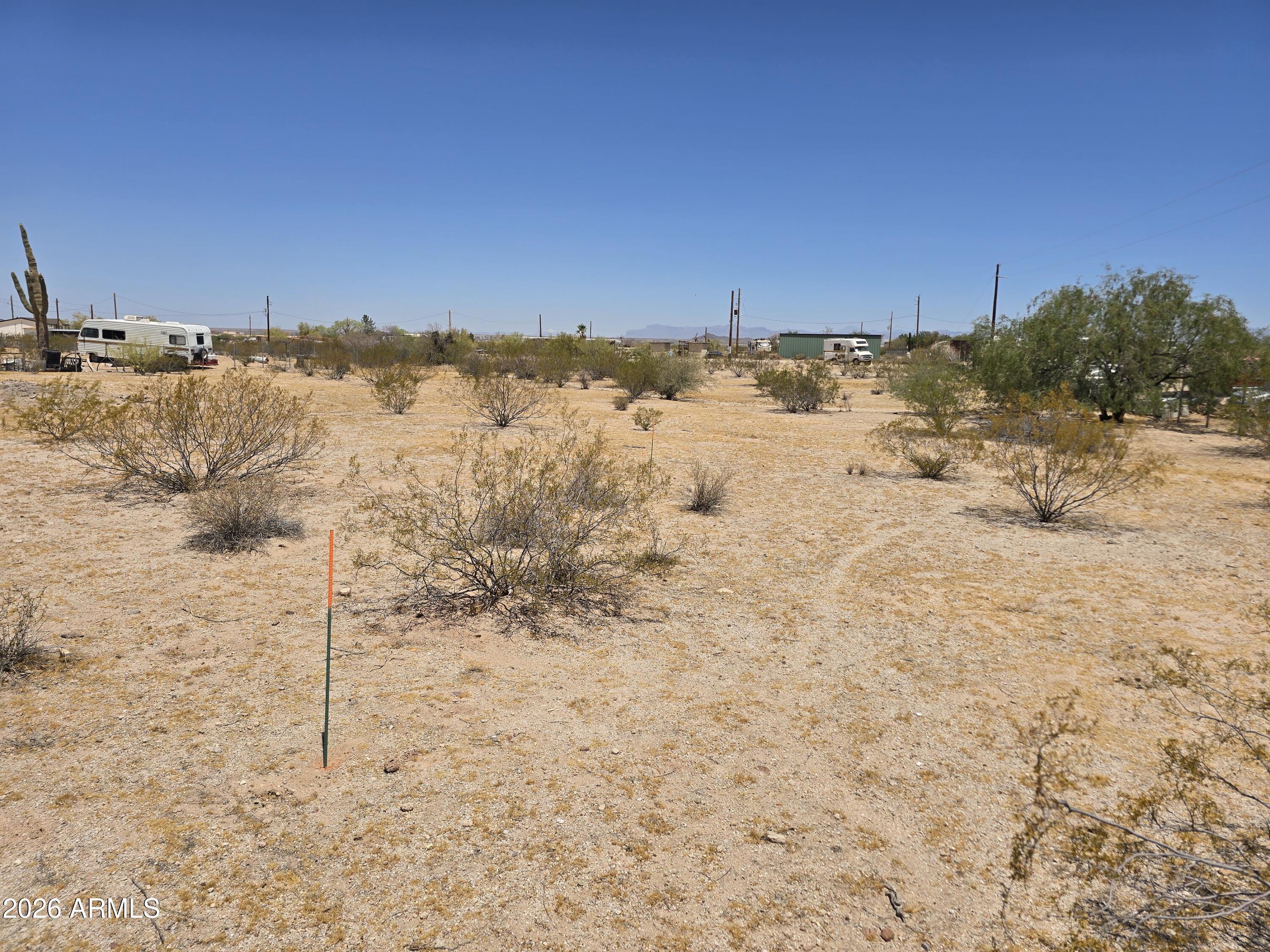 19876 East Firethorn Road, Unit 279 Florence, AZ 85132 - Photo 4 of 6 a view of ocean view with wooden bridge