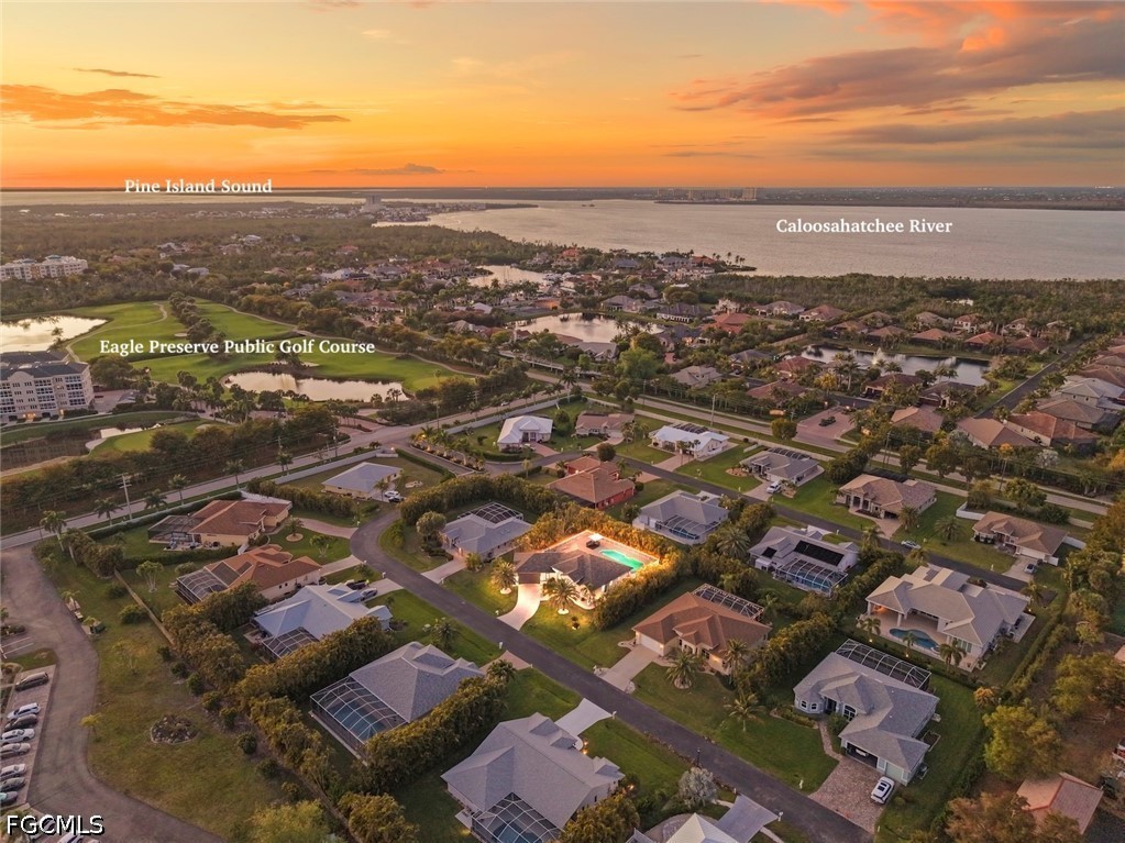 13570 Harbour Ridge Drive Fort Myers, FL 33908 - Photo 44 of 50 an aerial view of residential building with parking