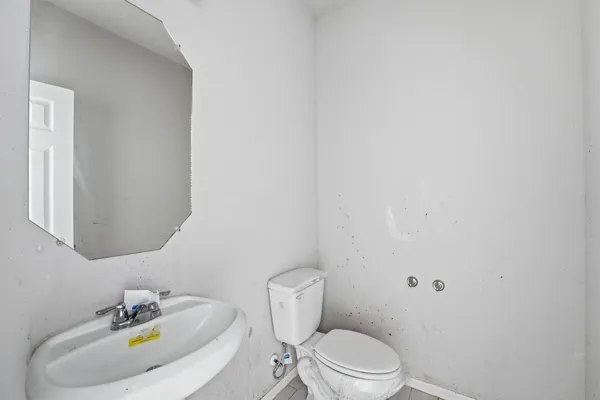 a bathroom with a sink and a toilet