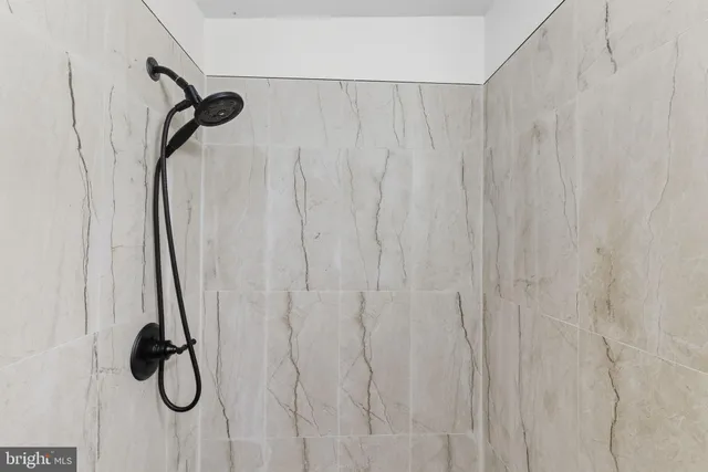 a bathroom with a shower curtain