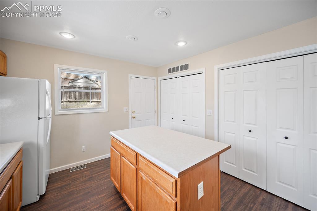4400 Rawhide Road, Unit 157 Pueblo, CO 81008 - Photo 17 of 36 a view of kitchen with wooden floor