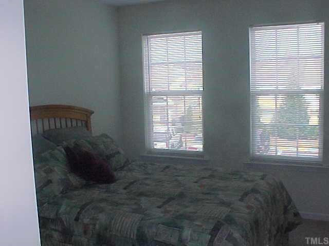 8443 Reedy Ridge Lane Raleigh, NC 27613 - Photo 7 of 10 Upper Level Guest Bedroom with Private Bath. Other