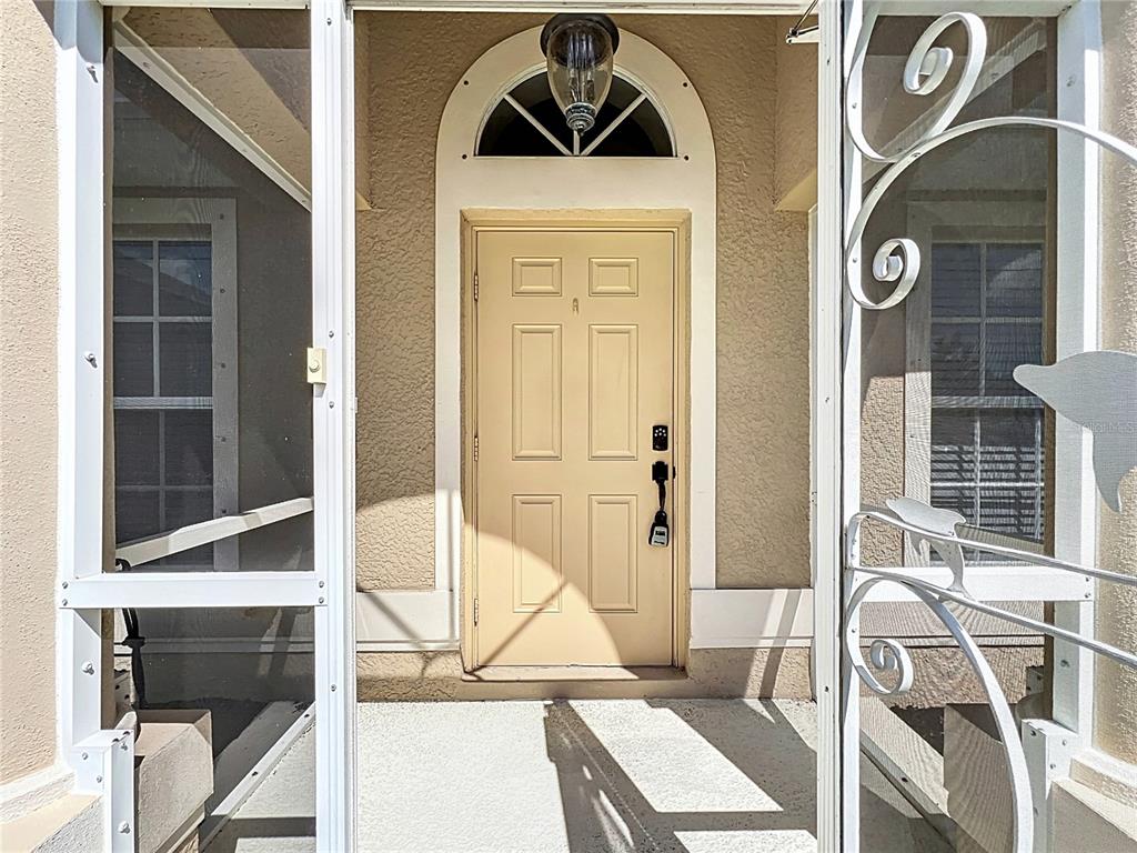123 Marker Road Rotonda West, FL 33947 - Photo 12 of 66 a view of front door of house