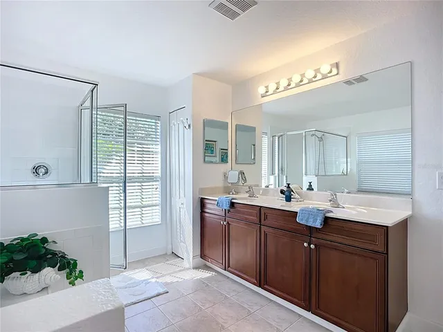 an aerial view of a house with a garden