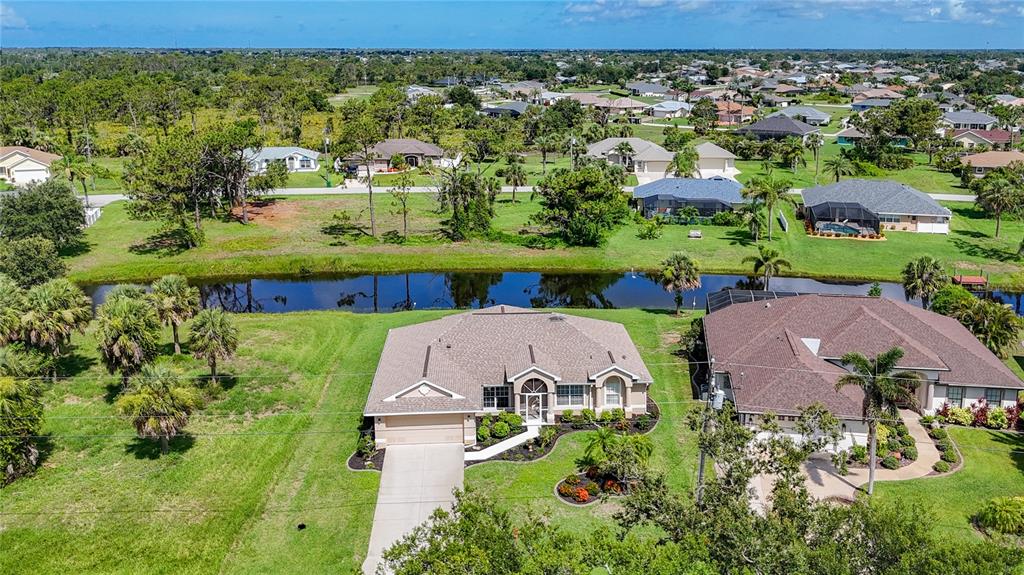 123 Marker Road Rotonda West, FL 33947 - Photo 7 of 66 an aerial view of multiple house