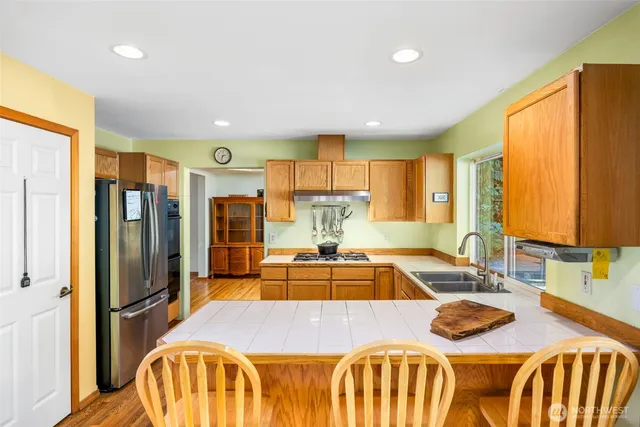 a view of a dining room with furniture