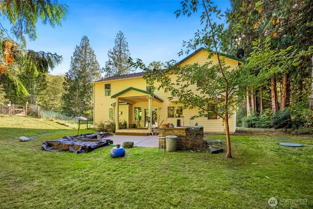 a childrens park with lots of swings and slides