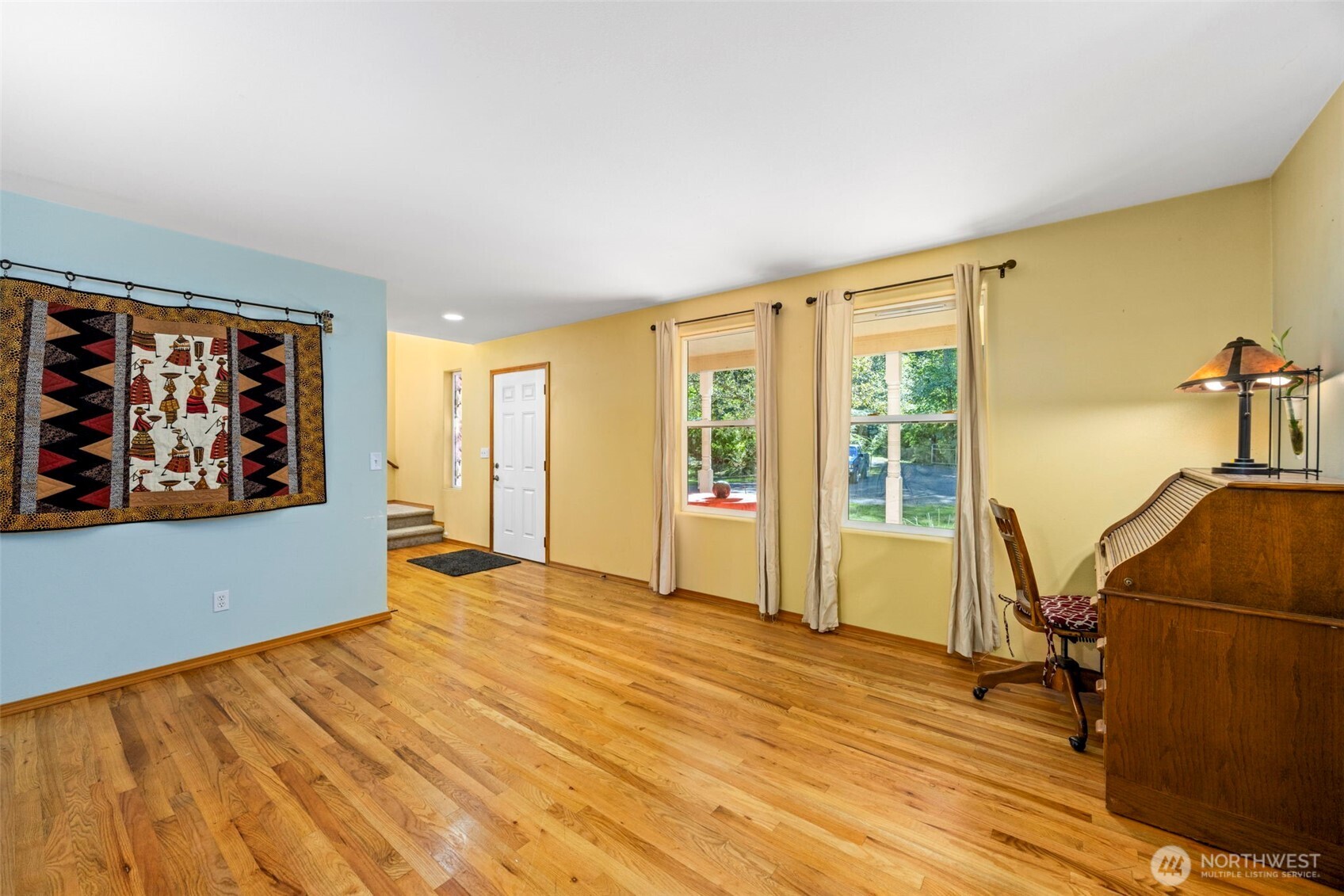 24165 Port Gamble Road Northeast Poulsbo, WA 98370 - Photo 7 of 37 a view of workspace with wooden floor and furniture