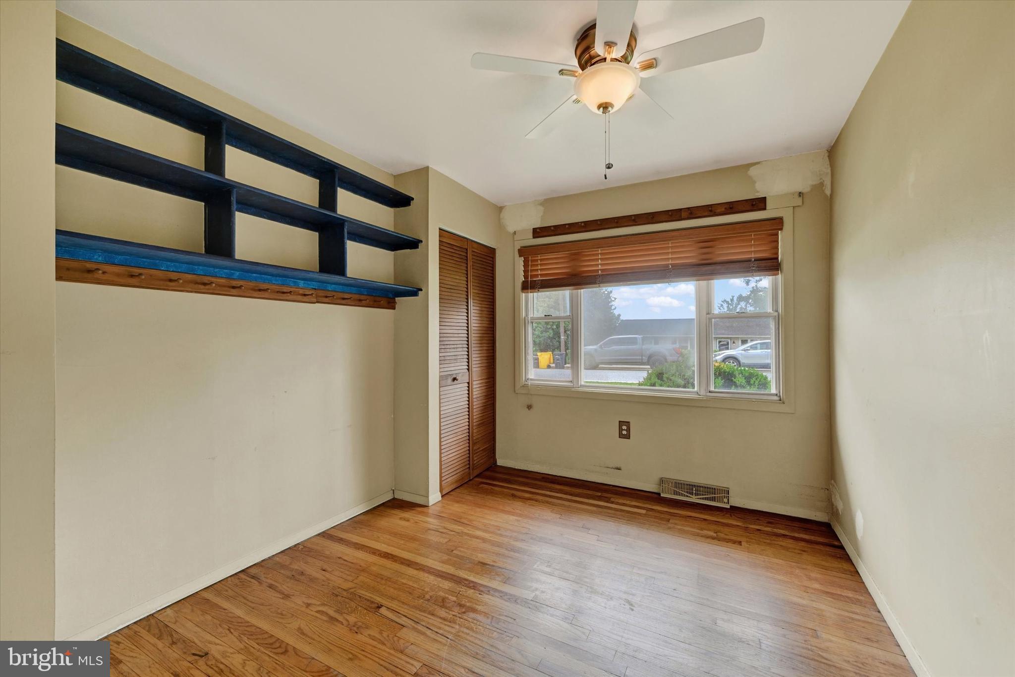 306 Regency Circle Linthicum Heights, MD 21090 - Photo 20 of 73 Bright bedroom with built-in shelving.
